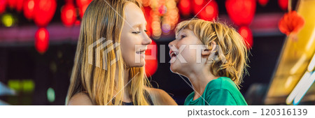 Mom and son celebrate Chinese New Year look at Chinese red lanterns BANNER, LONG FORMAT 120316139