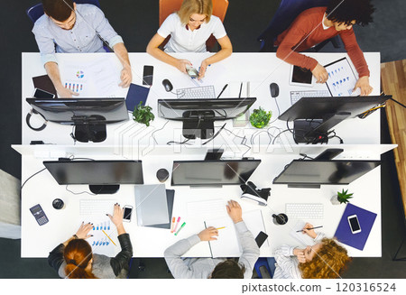 Business young multiethnic team working and planning start up in modern office, top view 120316524