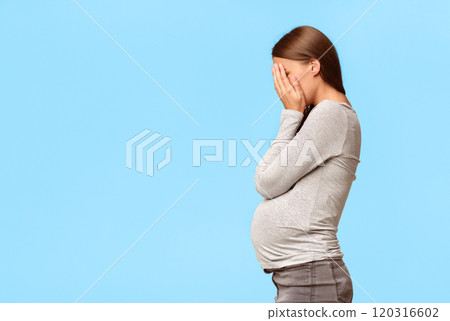Depression. Frustrated Pregnant Woman Covering Face With Hands Standing Over Gray Studio Background. Free Space Depression. Frustrated Pregnant Woman Covering Face With Hands Standing Over Gray Studio Background. Free Space 120316602