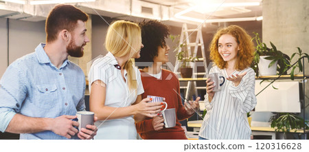 Happy millennial team during break time in office, enjoying coffee and communication, panorama 120316628
