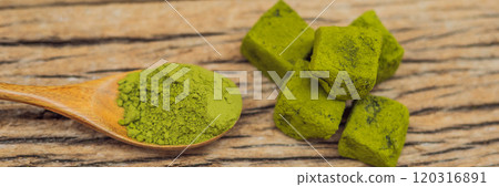 Matcha powder and candy made of matcha on wooden background. Homemade Matcha BANNER, LONG FORMAT 120316891