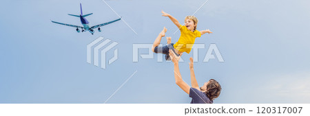 Father and son have fun on the beach watching the landing planes. Traveling on an airplane with children concept BANNER, LONG FORMAT Father and son have fun on the beach watching the landing planes. Traveling on an airplane with children concept BANNER, LONG FORMAT 120317007