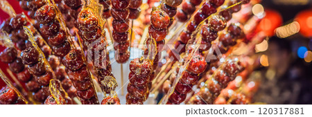 Traditional Chinese Dessert - Candied Fruit on a Wooden Stick BANNER, LONG FORMAT Traditional Chinese Dessert - Candied Fruit on a Wooden Stick BANNER, LONG FORMAT 120317881