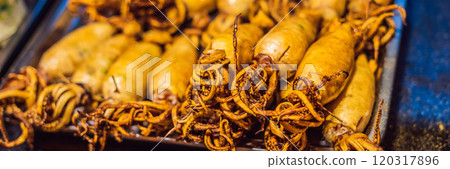 Street foods - Grilled squid Wangfujing night market BANNER, LONG FORMAT Street foods - Grilled squid Wangfujing night market BANNER, LONG FORMAT 120317896