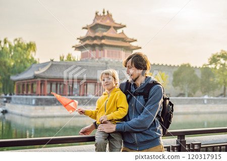 Enjoying vacation in China. Happy family with national chinese flag in Forbidden City. Travel to China with kids concept. Visa free transit 72 hours, 144 hours in China 120317915