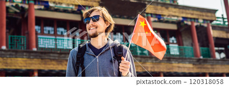 Enjoying vacation in China. Young man with national chinese flag on the background of the old Chinese street. Travel to China concept. Visa free transit 72 hours, 144 hours in China BANNER, LONG 120318058