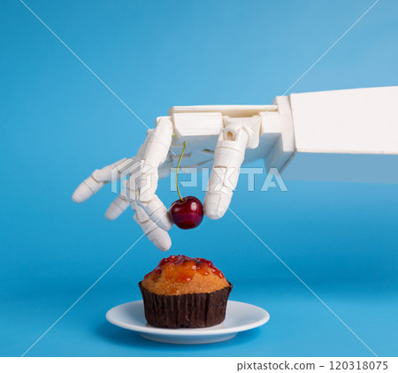 Chef robotic assistant in kitchen technology. Robot hand decorating sweet cupcake with fresh cherry, blue background Chef robotic assistant in kitchen technology. Robot hand decorating sweet cupcake with fresh cherry, blue background 120318075