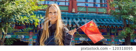 Enjoying vacation in China. Young woman with national chinese flag on the background of the old Chinese street. Travel to China concept. Visa free transit 72 hours, 144 hours in China BANNER, LONG 120318095