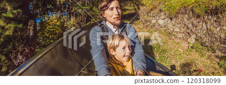 Dad and son have fun on alpine roller coaster BANNER, LONG FORMAT 120318099