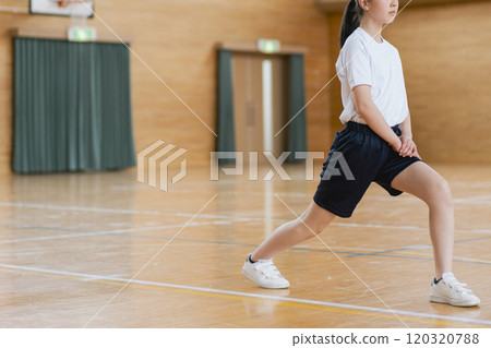 Girl stretching in the gym 120320788