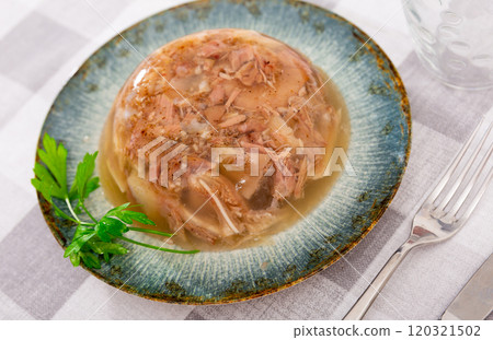 Bowl of homemade pork aspic, meat jelly 120321502