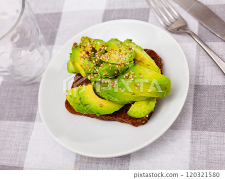 Sandwich with pieces of fresh avocado Sandwich with pieces of fresh avocado 120321580