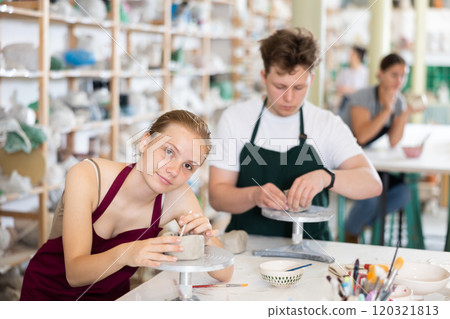 Teenage girl and teenage boy sculpt ceramic product Teenage girl and teenage boy sculpt ceramic product 120321813