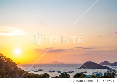 Sunset and sea in Labuan Bajo, Flores Island, Indonesia Sunset and sea in Labuan Bajo, Flores Island, Indonesia 120325694