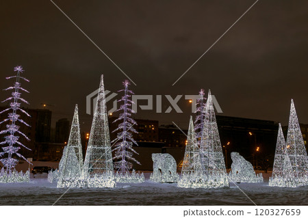 New Year's Eve illumination. Light festive decorations at night in city. Monochrome 120327659