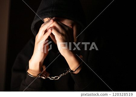 Man in handcuffs Man in handcuffs 120328519