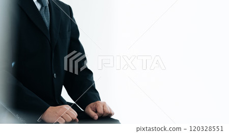 Middle-aged businessman having an interview Middle-aged businessman having an interview 120328551