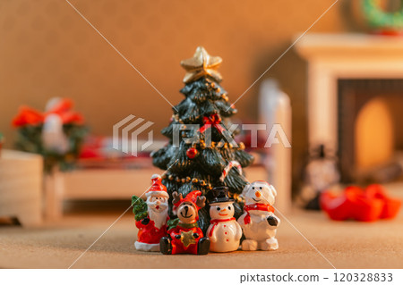 Miniature scene with Christmas tree, Santa, reindeer, snowman and polar bear 120328833