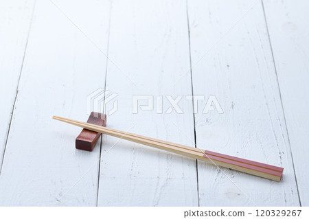 Chopstick rest and chopsticks (background material) Chopstick rest and chopsticks (background material) 120329267