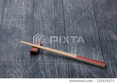 Chopstick rest and chopsticks (background material) Chopstick rest and chopsticks (background material) 120329273
