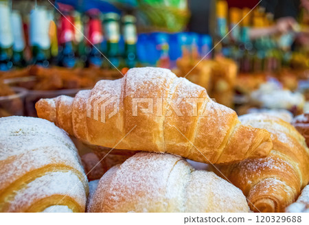 Delicious fresh croissants on the table, closeup 120329688