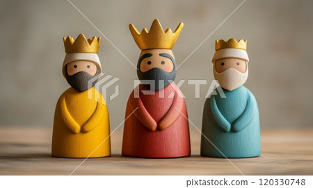 Small Three Kings figurines made of wood with golden crowns. Three Kings Day celebration, Epiphany 120330748