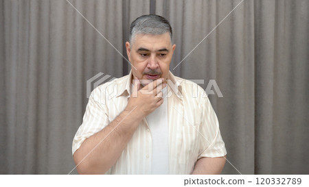 A man deep in thought. Reflections, decision making, doubts. 120332789
