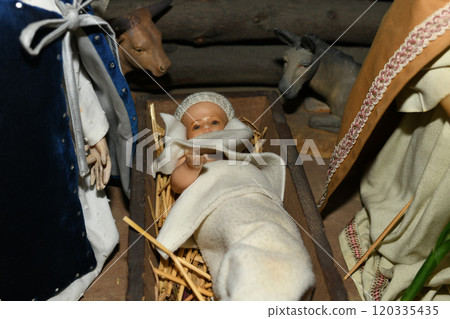 Baby Jesus laying in a cradle Baby Jesus laying in a cradle 120335435