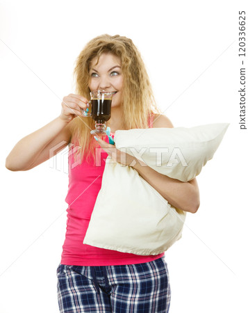 Happy woman holding toothbrush and coffee Happy woman holding toothbrush and coffee 120336625
