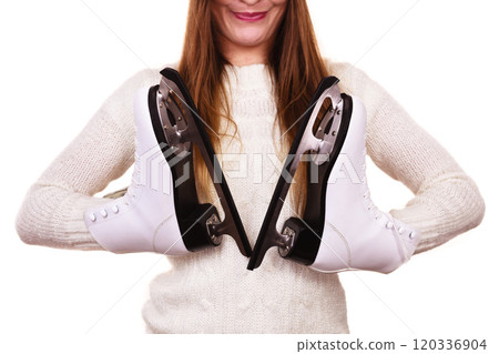 woman santa claus with ice skates woman santa claus with ice skates 120336904