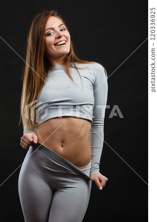 Sport fit woman in thermal clothes. 120336925