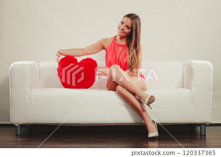 Woman with heart shape pillow. Valentines day love Woman with heart shape pillow. Valentines day love 120337365