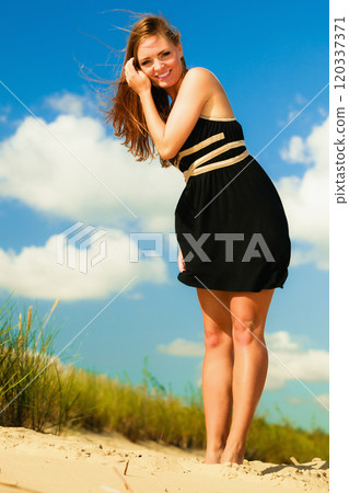 Happy woman beach holiday Happy woman beach holiday 120337371