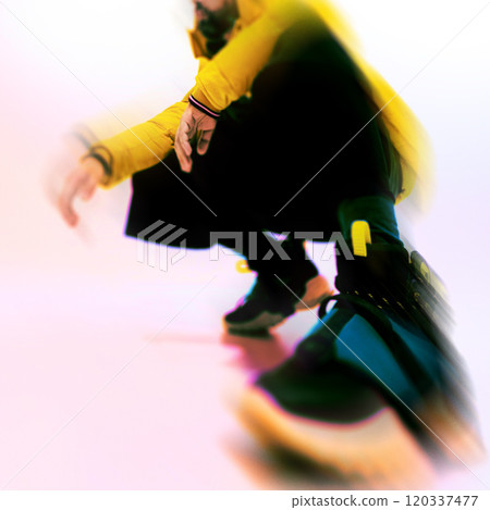 Contemporary art collage. Man crouching in dynamic pose, wearing yellow jacket and black shoes. Neon glow and motion blur effect. Contemporary art collage. Man crouching in dynamic pose, wearing yellow jacket and black shoes. Neon glow and motion blur effect. 120337477