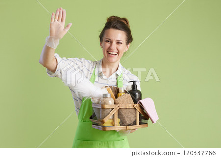 happy modern woman high five isolated on green background happy modern woman high five isolated on green background 120337766