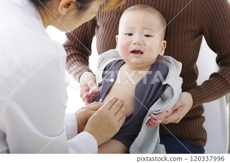Baby being examined at hospital Baby being examined at hospital 120337996