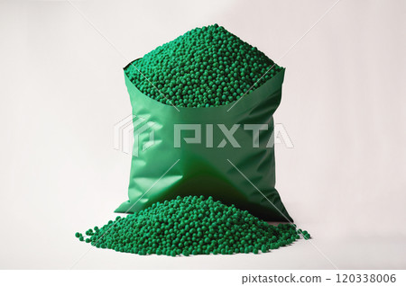 Bag with green biodegradable plastic granules. Isolated 120338006