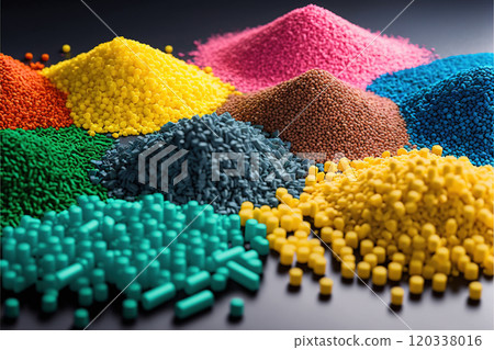 biodegradable plastic granules different colors on table 120338016