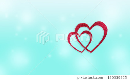 Blue background with red hearts in blurred focus. Festive background for Valentine's Day, Birthday 120339325