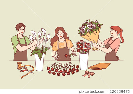 Flower shop employees collect festive bouquets for wedding or holiday party decoration. 120339475