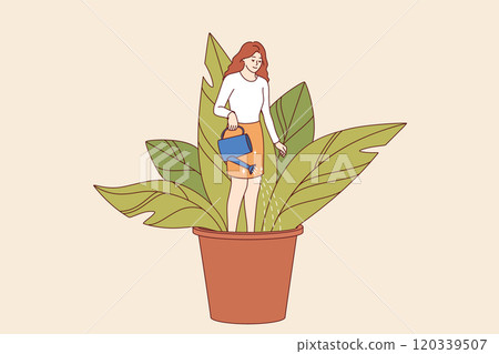 Woman engaged in self-development and personality improvement, standing in flower pot, field soil 120339507