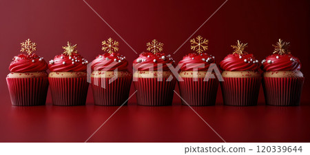Christmas, New Year. Row cupcakes color red, burgundy simple background, Holiday poster, copy space Christmas, New Year. Row cupcakes color red, burgundy simple background, Holiday poster, copy space 120339644