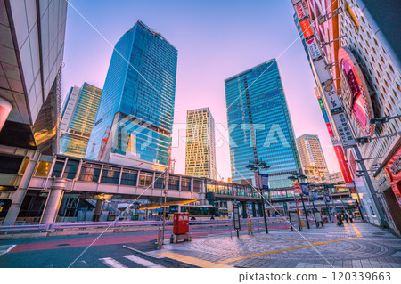 Tokyo cityscape in Japan at dawn...View of Shibuya Station and buildings from Wave Street = Saturday, November 9th, 6:53am Tokyo cityscape in Japan at dawn...View of Shibuya Station and buildings from Wave Street = Saturday, November 9th, 6:53am 120339663