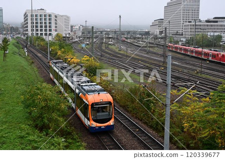A morning at Heidelberg Central Station: trains and trams arriving and departing one after another A morning at Heidelberg Central Station: trains and trams arriving and departing one after another 120339677