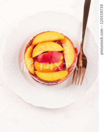 Overnight chia pudding dessert with greek yogurt, peaches and jam 120339738