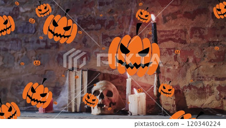 Image of halloween pumpkins over candles and skull on brick wall background 120340224