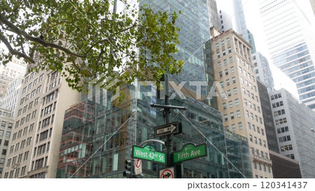 Fifth avenue, 5 ave road sign, Manhattan midtown architecture, New York City 5th av street corner. 120341437