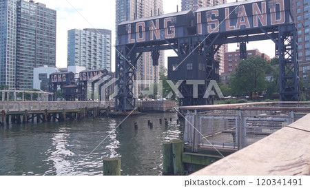 New York City Gantry Plaza old dock pier, Long Island sign, Hunters Point, Queens, United States. New York City Gantry Plaza old dock pier, Long Island sign, Hunters Point, Queens, United States. 120341491