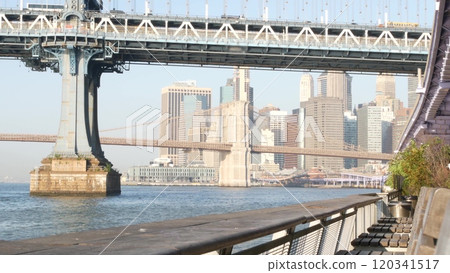 New York City Manhattan Bridge to Brooklyn. Waterfront downtown skyline cityscape, river Pier 35. 120341517