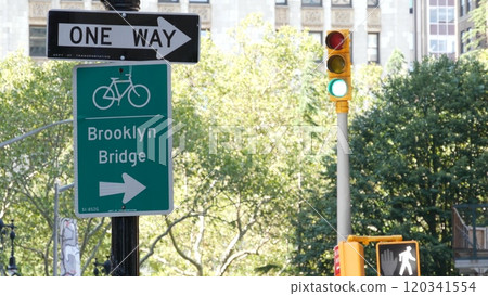 Bike lane road sign, New York City. Brooklyn Bridge bicycle path, cycle route in Manhattan downtown. 120341554